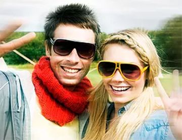 couple wearing polarised sunglasses